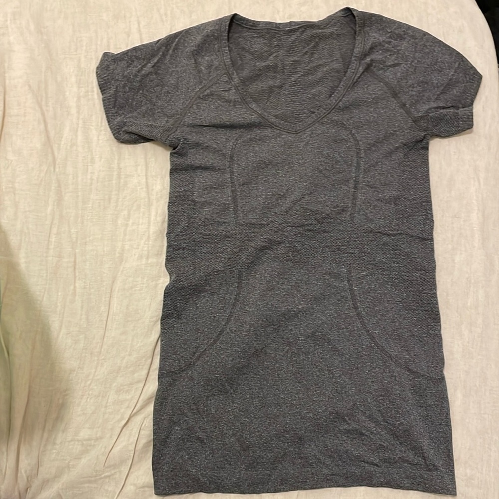 Grey Lululemon Run Swiftly short sleeve shirt in size 4